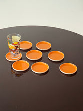 Load image into Gallery viewer, Sottobicchieri in plastica arancione anni &#39;60
